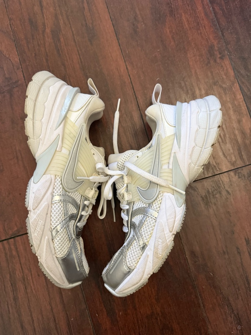 Nike Women’s White and Silver Sneakers